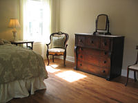 Master bedroom with beautiful antiques and ensuite